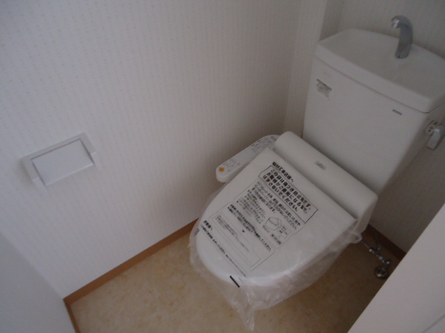 洗面所 ウォシュレット付きトイレ 写真12